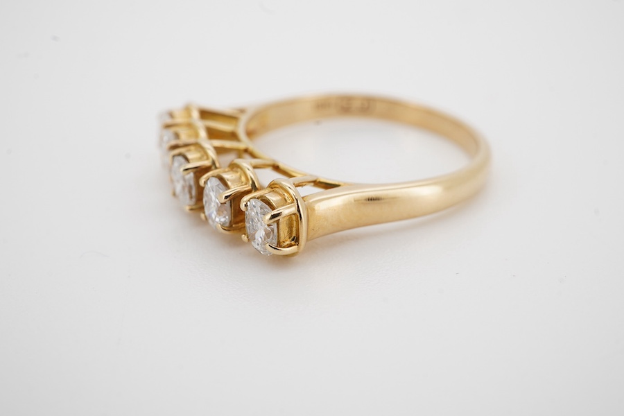 A modern 18ct gold and five stone oval cut diamond set half hoop ring, size N, gross weight 3.8 grams. Condition - fair to good